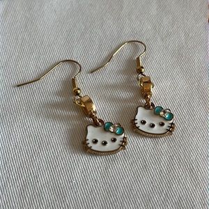 Gold Tone White Cat Blue Bow Earrings